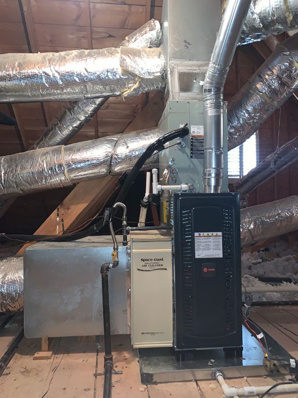 Furnace and air handler in a residential attic